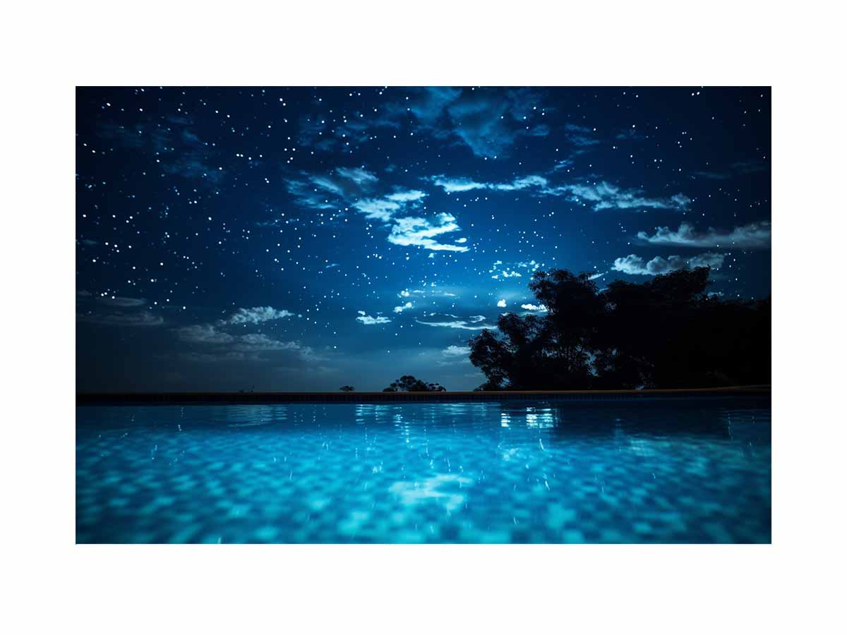 Celestial Pool Night star filled night sky above glowing turquoise pool water for modern home decor.