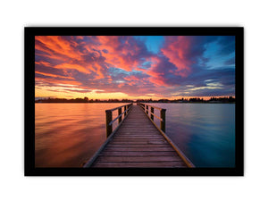 Dramatic sunset pier canvas art for coastal living room and bedroom decor.