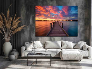 Dramatic sunset pier canvas art for coastal living room and bedroom decor.