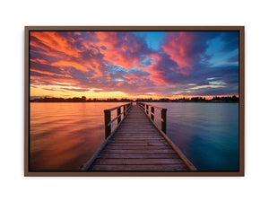 Dramatic sunset pier canvas art for coastal living room and bedroom decor.