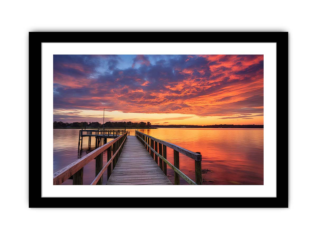 Sunset jetty canvas print with glowing water for modern living room decor.