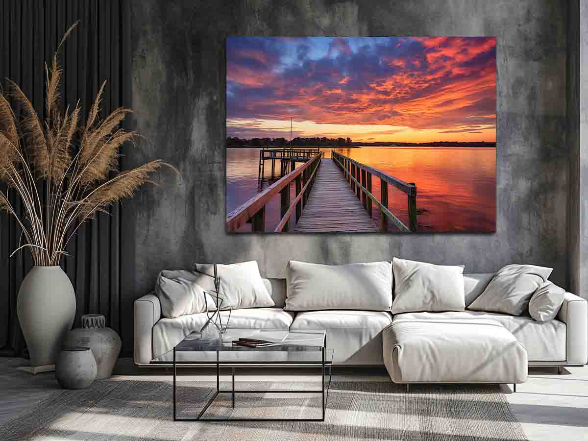 Sunset jetty canvas print with glowing water for modern living room decor.