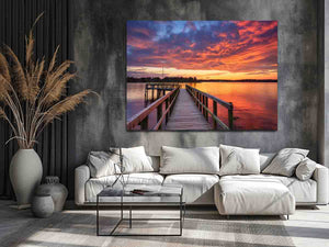 Sunset jetty canvas print with glowing water for modern living room decor.