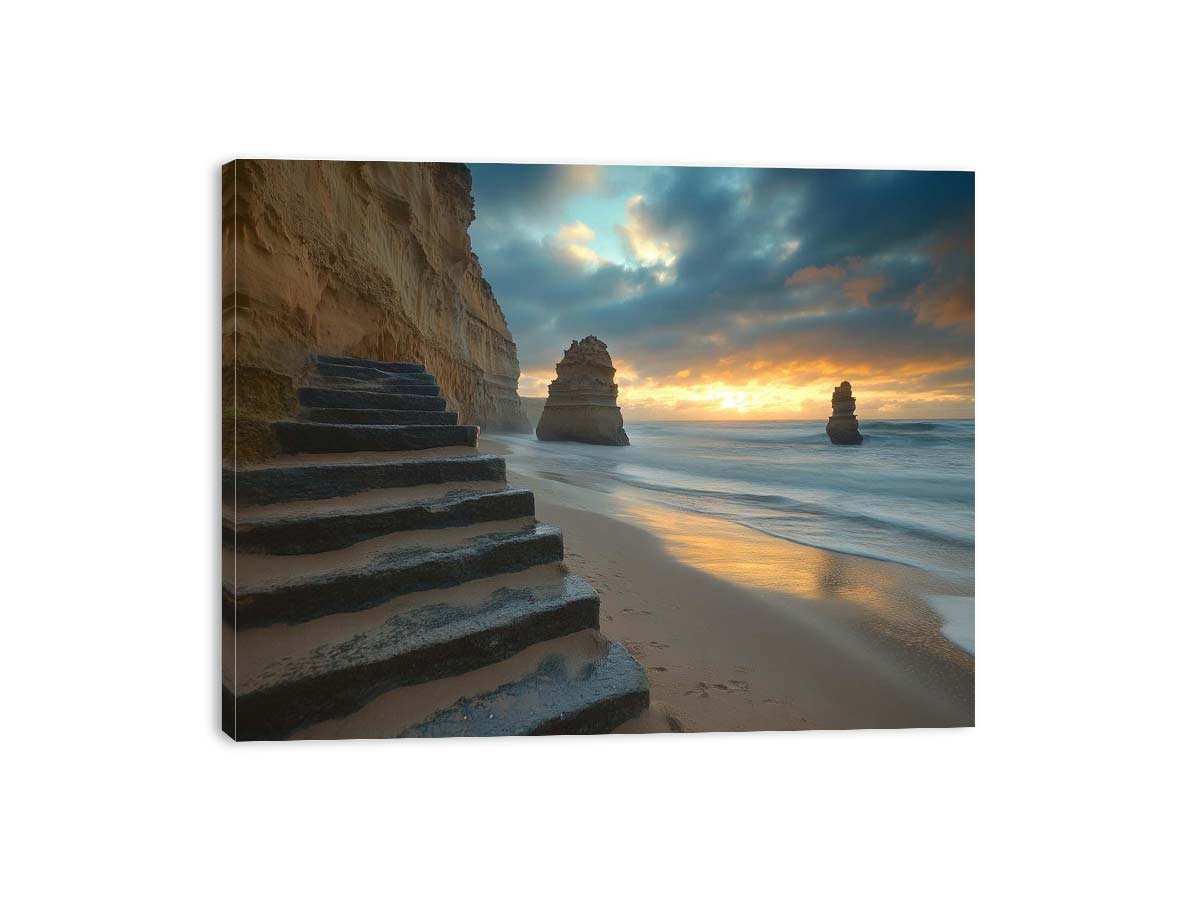 Moody coastal beach photograph with cliffs and stairs for luxury decor.