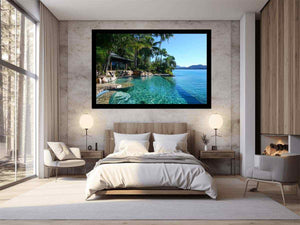 Tropical lagoon pool photograph for luxury coastal living room decor.