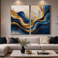 Blue and gold abstract wave canvas art for luxury modern living room decor.
