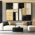 Black and gold geometric abstract canvas art for modern office decor.