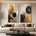 Modern black and gold geometric diptych wall art for contemporary living room decor