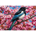 Blue bird among pink blossoms canvas print for elegant bedroom decor.