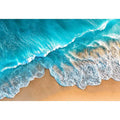Aerial turquoise ocean beach canvas print with white foamy waves washing over sandy shore and tropical coastal water view