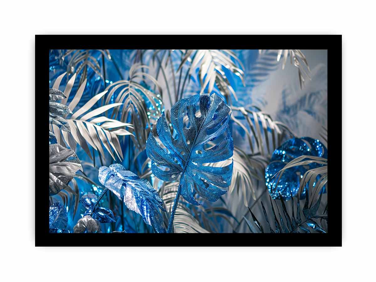 Blue tropical leaf canvas art with silver palm foliage for glamorous modern wall decor.