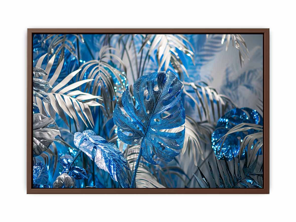 Blue tropical leaf canvas art with silver palm foliage for glamorous modern wall decor.