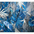 Blue tropical leaf canvas art with silver palm foliage for glamorous modern wall decor.