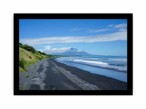 Black Sand Horizon canvas art featuring black sand beach, ocean and distant mountain for modern living room decor.