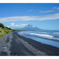 Black Sand Horizon canvas art featuring black sand beach, ocean and distant mountain for modern living room decor.