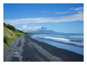 Black Sand Horizon canvas art featuring black sand beach, ocean and distant mountain for modern living room decor.