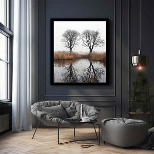 Misty winter trees reflected in still marsh water for serene vertical wall art.