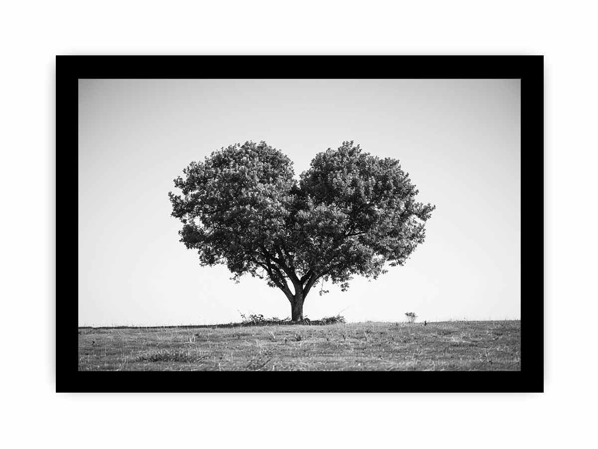 Black and white lone heart-shaped tree canvas art for minimalist room decor.