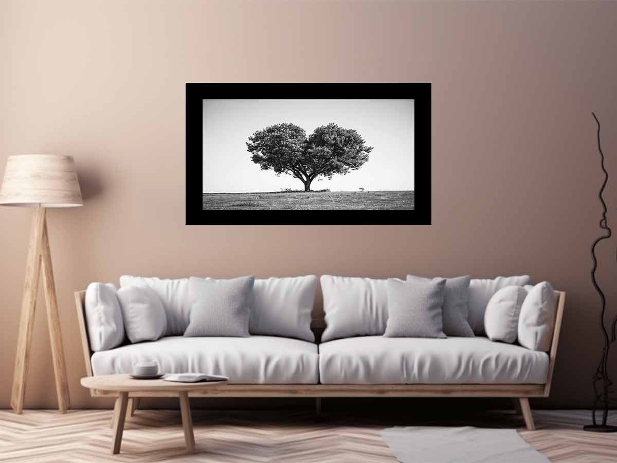 Black and white lone heart-shaped tree canvas art for minimalist room decor.
