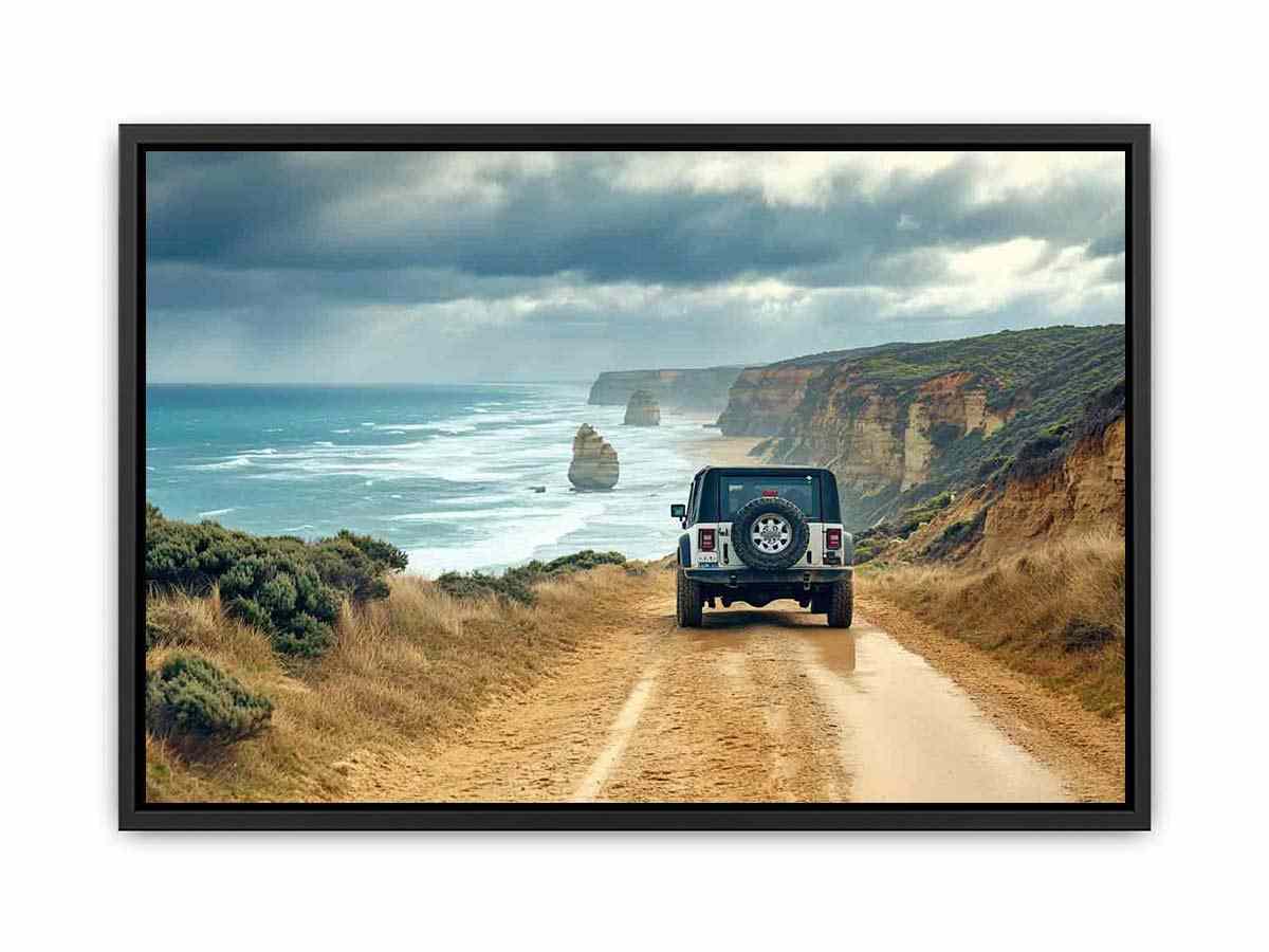 Off-road vehicle on a coastal dirt track overlooking turquoise waves, limestone sea stacks and golden cliffs beneath a cloudy sky