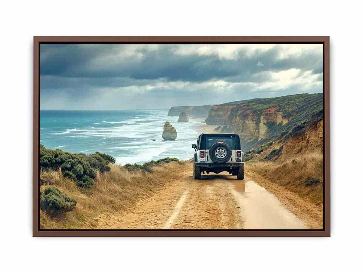 Off-road vehicle on a coastal dirt track overlooking turquoise waves, limestone sea stacks and golden cliffs beneath a cloudy sky