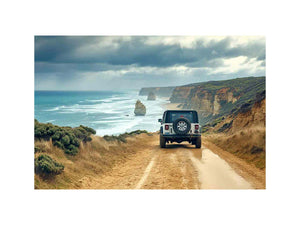 Off-road vehicle on a coastal dirt track overlooking turquoise waves, limestone sea stacks and golden cliffs beneath a cloudy sky