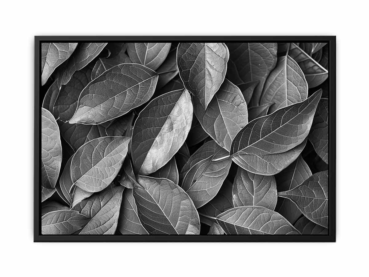 Black and white botanical leaves canvas art for calm modern bedroom decor.