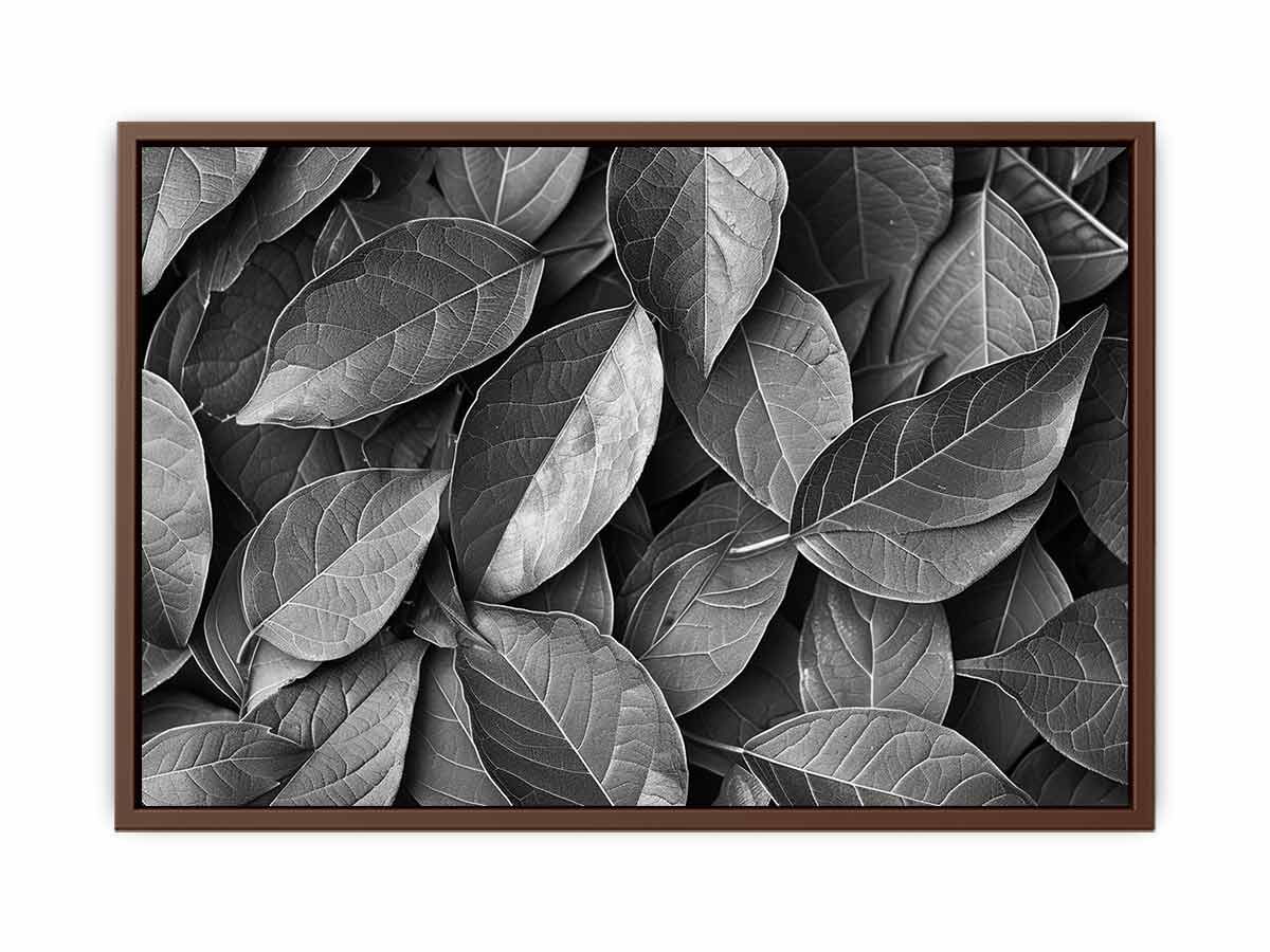 Black and white botanical leaves canvas art for calm modern bedroom decor.
