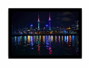 Neon city skyline canvas art with waterfront reflections for modern office decor.