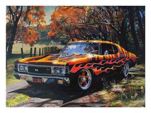 Black muscle car canvas art with orange flames for man cave wall decor.