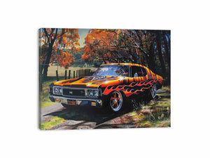 Black muscle car canvas art with orange flames for man cave wall decor.