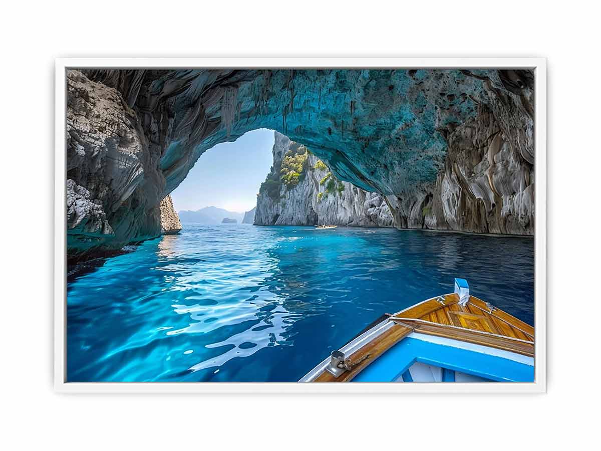 Blue sea cave photography canvas art with boat view for coastal living room decor.