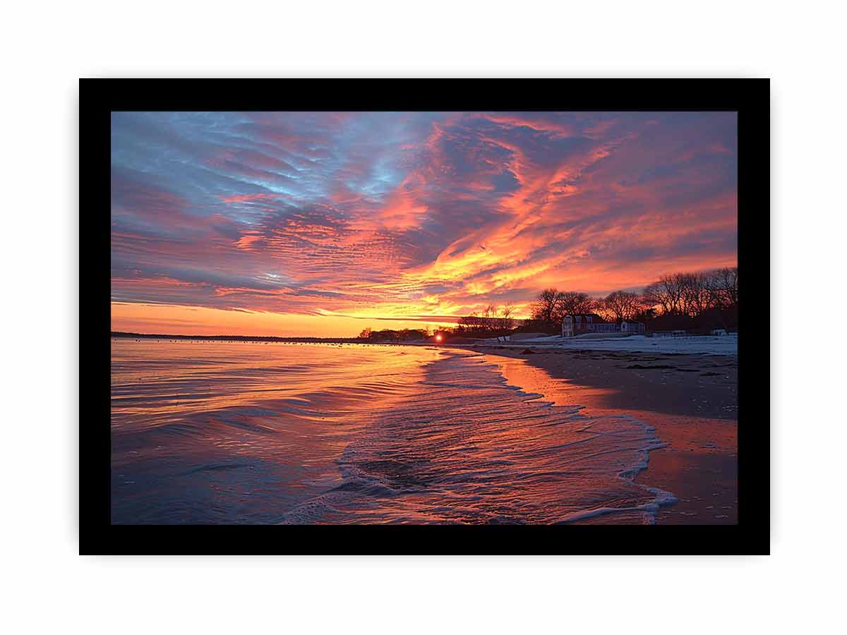 Dramatic coastal sunset canvas art for warm modern living room decor.