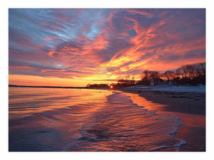 Dramatic coastal sunset canvas art for warm modern living room decor.