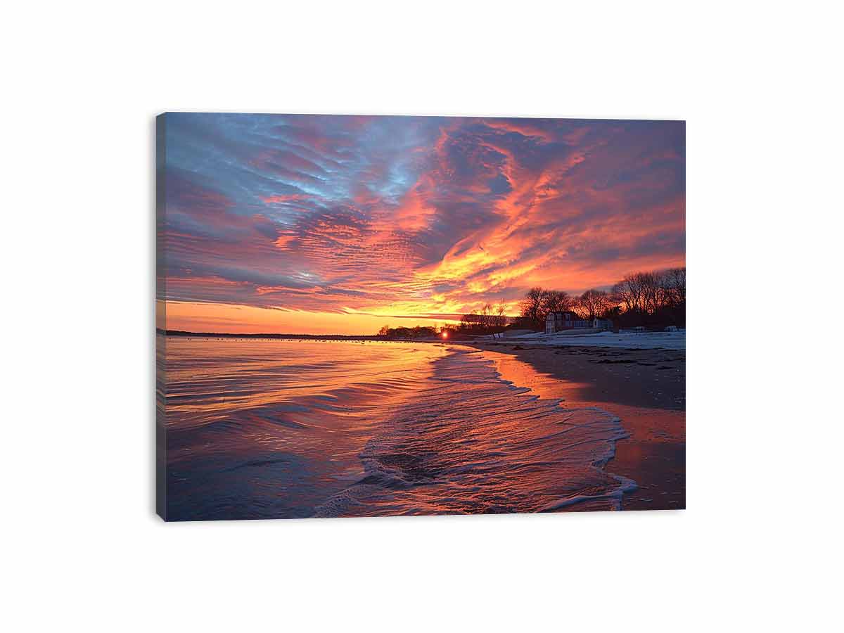 Dramatic coastal sunset canvas art for warm modern living room decor.