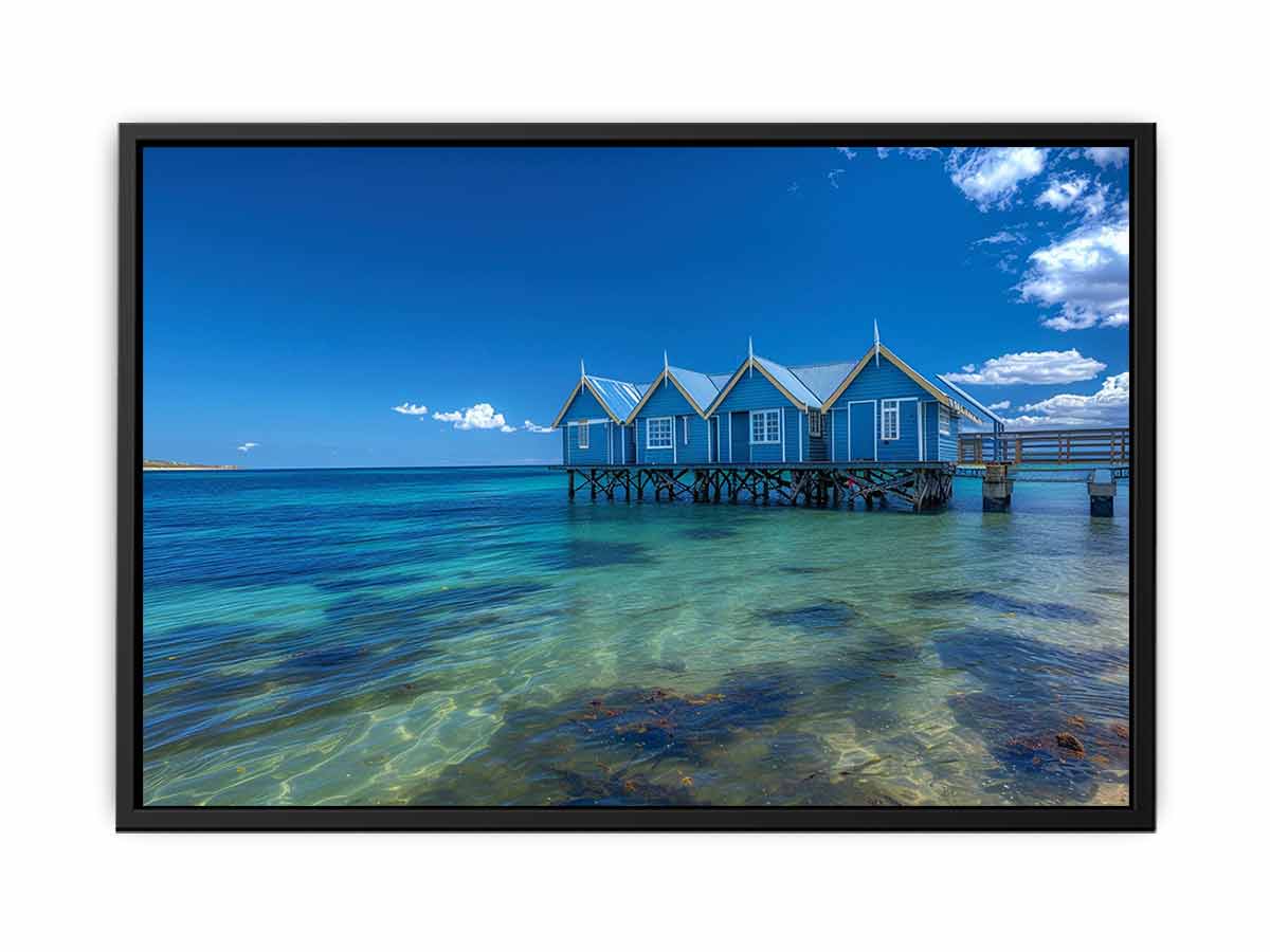 Blue coastal beach hut canvas photography for fresh beach house living room decor.