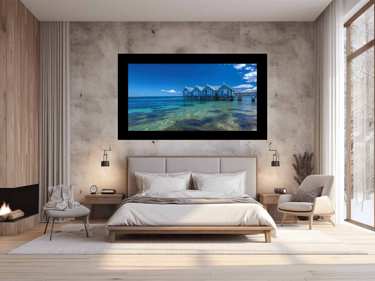 Blue coastal beach hut canvas photography for fresh beach house living room decor.