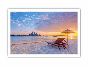 Coastal sunset canvas art with beach chairs and city skyline for relaxed living room decor.