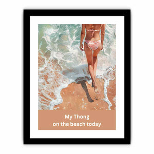 Woman walking on sandy beach with ocean foam and casual text for coastal bathroom decor.