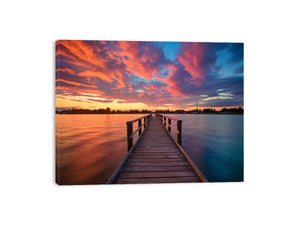 Dramatic sunset pier canvas art for coastal living room and bedroom decor.
