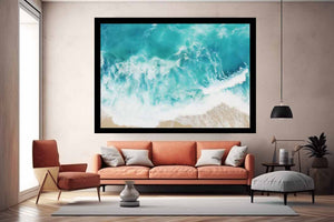 Aerial ocean wave canvas print for bright coastal living room decor.