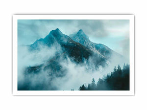 Misty blue mountain canvas art with fog and evergreen trees for modern living room decor.