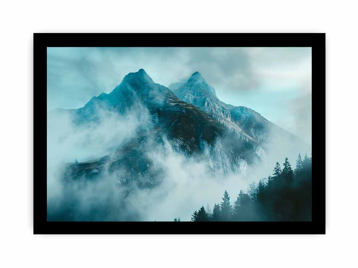 Misty blue mountain canvas art with fog and evergreen trees for modern living room decor.