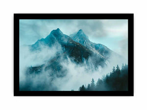 Misty blue mountain canvas art with fog and evergreen trees for modern living room decor.