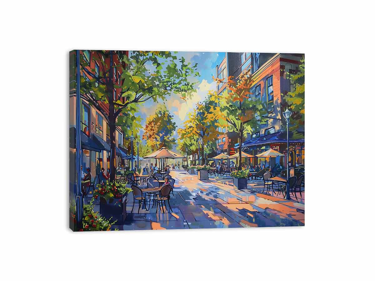Colorful cafe street canvas art with trees and outdoor tables for modern living room decor.