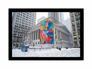 City architecture canvas print with colorful mural on snowy building for modern office decor.