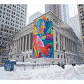 City architecture canvas print with colorful mural on snowy building for modern office decor.
