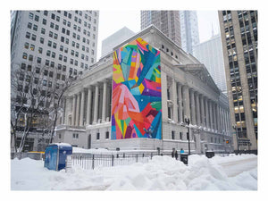 City architecture canvas print with colorful mural on snowy building for modern office decor.