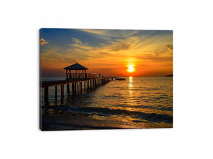Golden sunset pier canvas print with ocean and gazebo for warm coastal living room decor.
