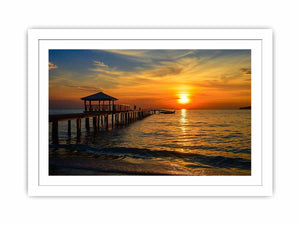 Golden sunset pier canvas print with ocean and gazebo for warm coastal living room decor.
